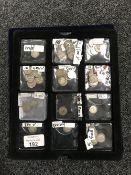 A collection of two trays of silver three pence pieces 1920's 1930's.