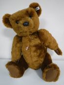 A large Steiff brown mohair bear PB55, length 55 cm.