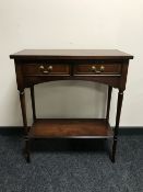 An inlaid side table fitted two drawers
