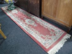 A pink fringed Chinese style runner