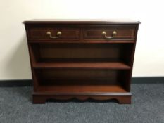 A set of inlaid open shelves fitted two drawers