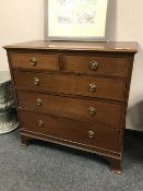 A Georgian style inlaid mahogany five drawer chest,