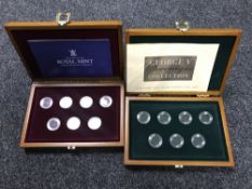 Two display cases/boxes, each for 7 Sovereigns.