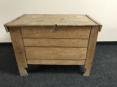 A rustic pine hay bin