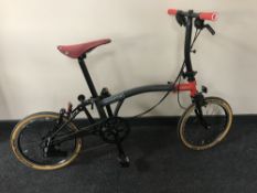 A Brompton CHPT 3 folding light weight bicycle, frame number 651147,