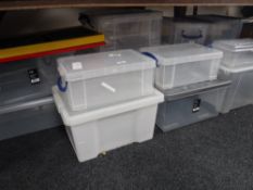 A quantity of plastic storage crates