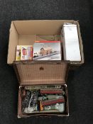 A box of vintage leather case containing rolling stock,