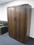 A mid 20th century oak double door wardrobe