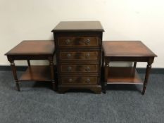 An inlaid mahogany audio cabinet and a pair of side tables