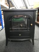 A Club electric fire in the form of a stove