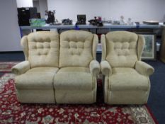 Two seater settee and armchair in a gold button fabric