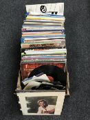 A box containing LP's including Now Compilations,
