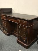 A Victorian mahogany twin pedestal writing desk, 123 cm.