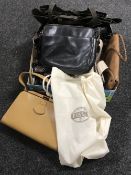 A box of tan leather hand bag,