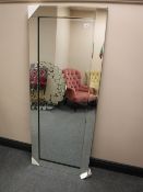 An all glass bevelled edged hall mirror