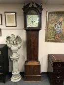 A nineteenth century oak longcase clock with painted dial by J A Thompson of Darlington,
