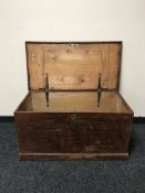 An antique pine blanket box
