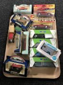 A tray of boxed and unboxed diecast vehicles,