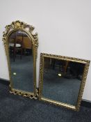An ornate gilt framed hall mirror and one other