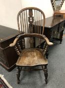 A nineteenth century elm Windsor armchair