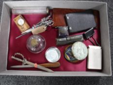 A box of scissors, tweezers, vintage inkwells, paperweights,