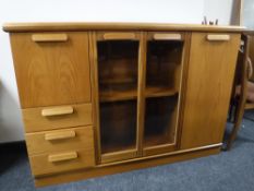A late 20th century teak sideboard