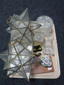 A tray of glass ware, two star light shades,