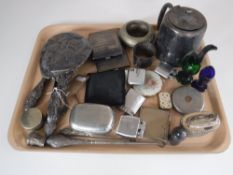 A tray of plated wares, silver cigarette case, mirror and brush back, assorted lighters, compacts,