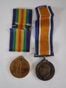 A First World War pair comprising Victory Medal and British War Medal, named to Lieut. J. W.