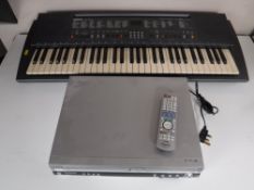 A Panasonic DVD VCR recorder with remote together with a Yamaha PSR 200 keyboard