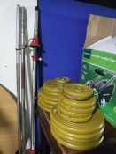 Three weights bars and over 100 kg of cast iron weights