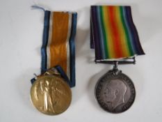 A First World War pair comprising Victory Medal and British War Medal, named to E. Trigg V.A.D.