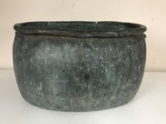 An antique oval tin tub