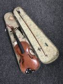 An early twentieth century violin and bow in coffin case