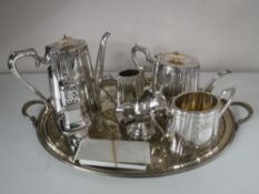 A Victorian four piece plated tea service on tray together with a further silver plated sugar