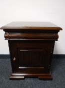 A Barker and Stonehouse mahogany cabinet fitted with a drawer