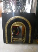 A cast iron fire insert