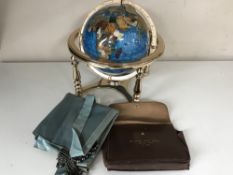 A gemstone globe on brass stand (missing foot) together with a pouch of freemasons apron