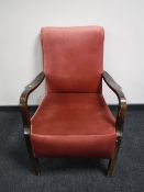 A 20th century armchair in pink dralon