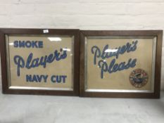 Two Edwardian oak frames containing Players cigarette advertising CONDITION REPORT: