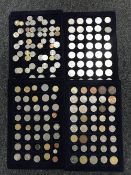 Five trays of various coins - British and world coins.