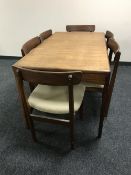 A mid 20th century teak eight piece dining room suite