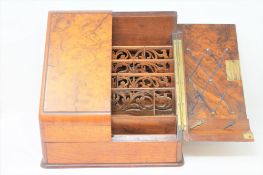A Victorian walnut sloped-front correspondence box.