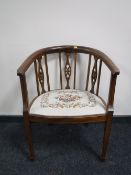A Victorian inlaid mahogany tapestry seated armchair