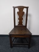 A Victorian oak hall chair