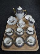 A tray of fifteen piece Royal Doulton tea service together with two commemorative cup and saucers