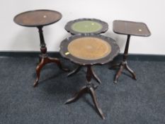 Four pedestal wine tables