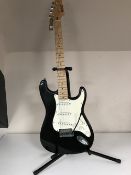 A Hohner Rockwood electric guitar on stand