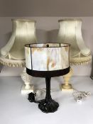 A President 31 day wall clock together with two marble table lamps with shades and a Tiffany style