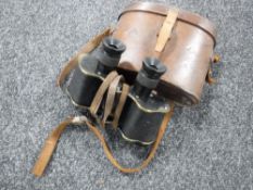 A pair of Watson and Son leather cased military binoculars